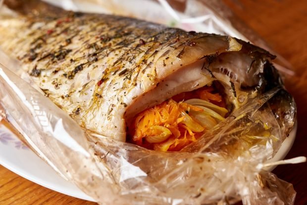 Stuffed carp in a sleeve is a simple and delicious recipe, how to cook step by step