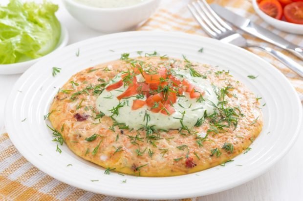 Omelet with yogurt, melted cheese and bacon in the oven