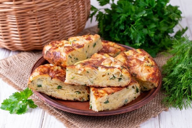 Casserole of zucchini with cheese and herbs in a slow cooker