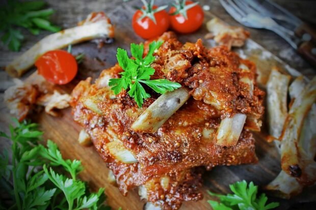 Pork ribs baked in breadcrumbs