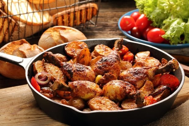 Chicken legs with potatoes and vegetables