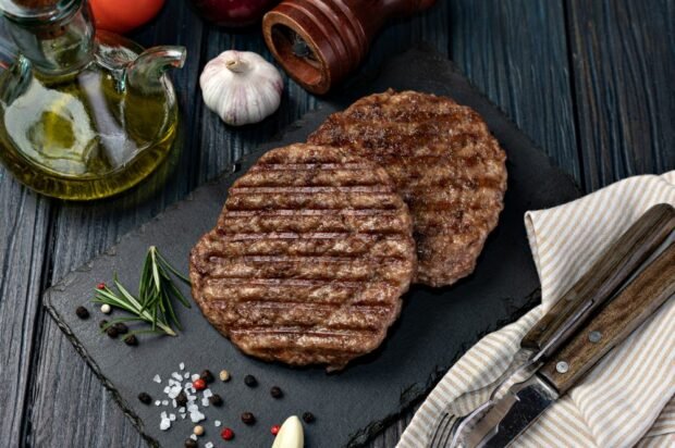 Beef patties on a grill pan