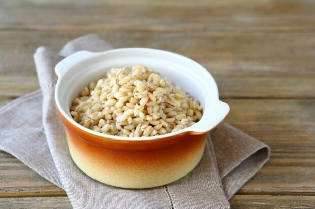 Pearl porridge on water in a slow cooker 