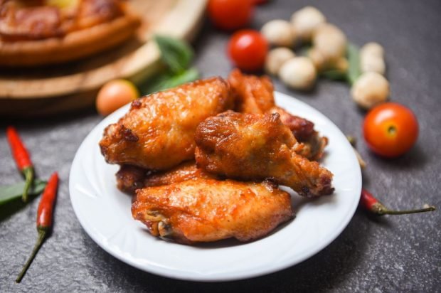 Chicken wings baked in barbecue sauce