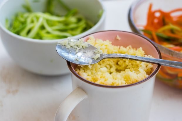 Wheat porridge with cheese in a slow cooker 