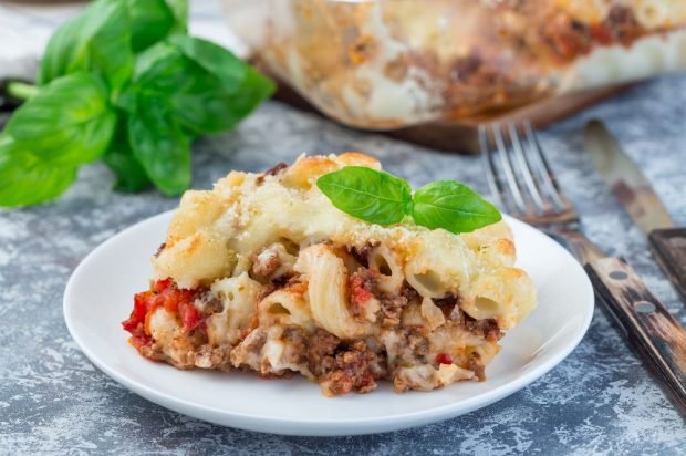 A casserole of pasta and ground beef in a slow cooker 