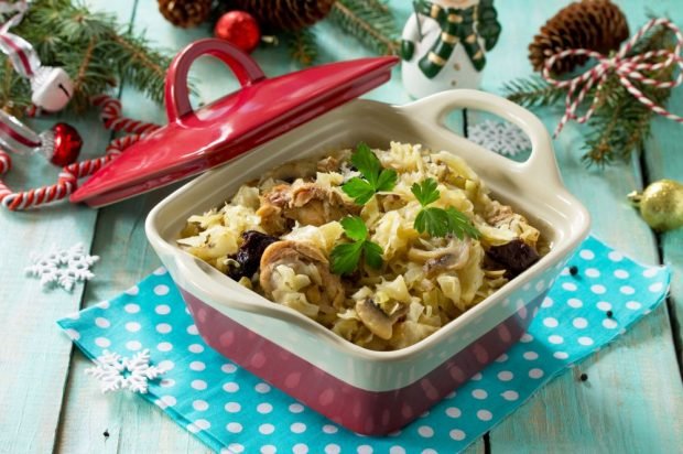 Rabbit stewed with prunes, cabbage and champignons