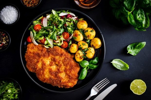 Pork chops baked in batter with hot spices