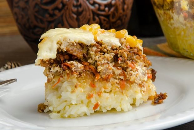 Rice casserole with minced meat in a slow cooker 