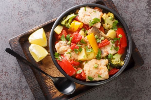 Stew of fish and vegetables in a slow cooker 