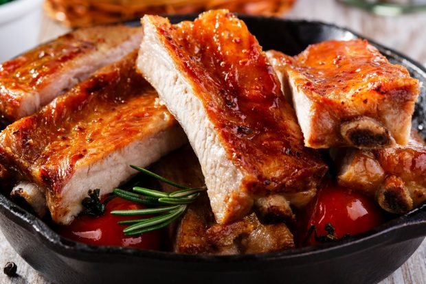 Pork ribs with vegetables in the oven