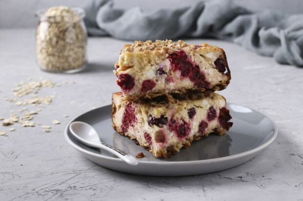 Cottage cheese casserole with oat flakes, nuts and cherries