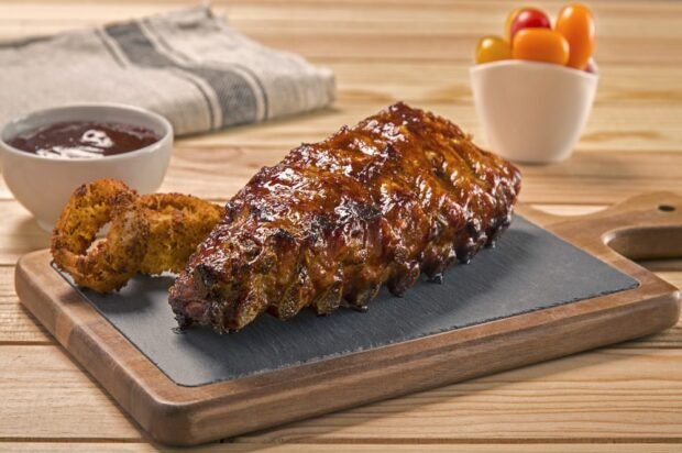 Pork ribs with barbecue sauce in the oven