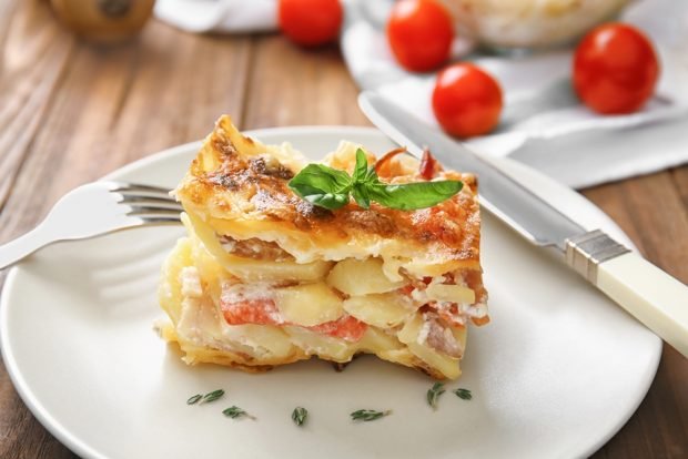 Potato casserole with tomatoes in a slow cooker