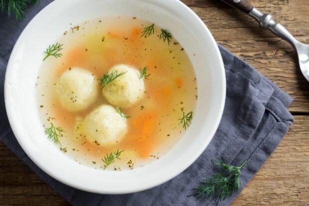 Beef broth soup with cheese dumplings 