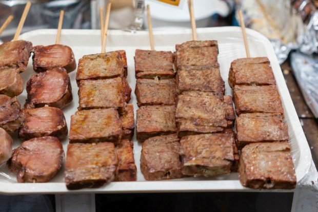 Beef tongue kebab on the grill 