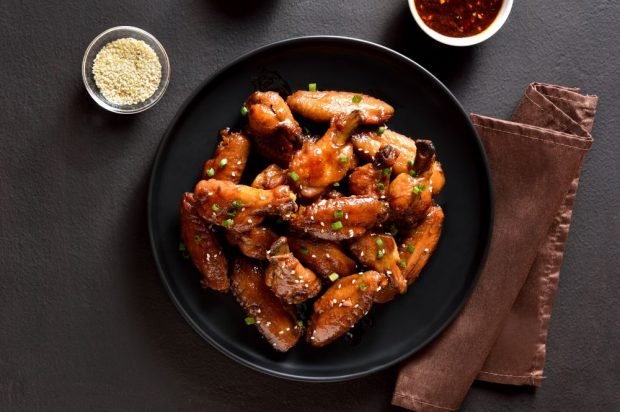 Chicken wings baked in hot sauce