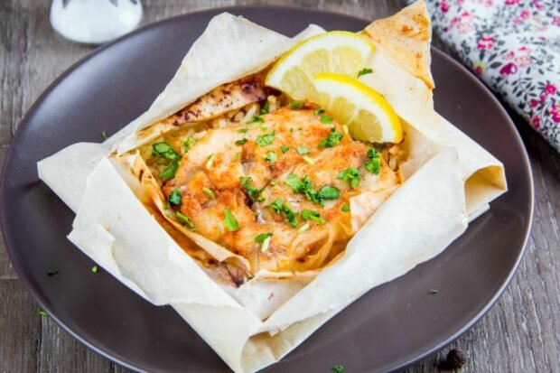 Baked hake with rice in the oven