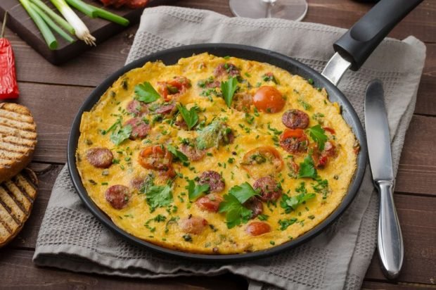 Omelet with chorizo and cherry tomatoes