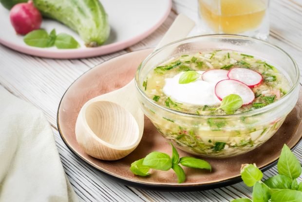 Okroshka with broth and sour cream