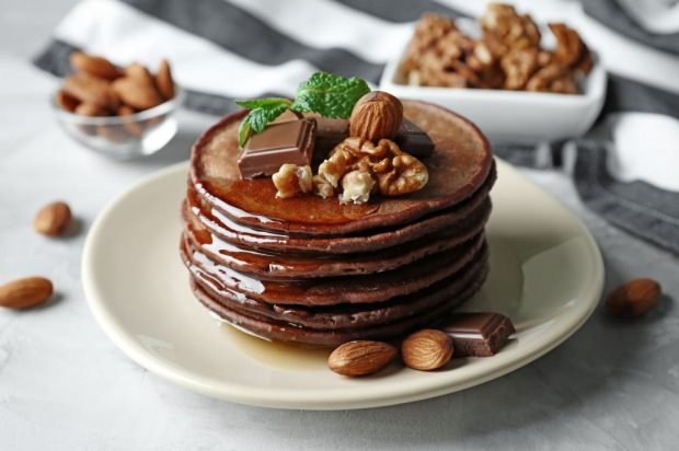 Chocolate pancakes on ricotta