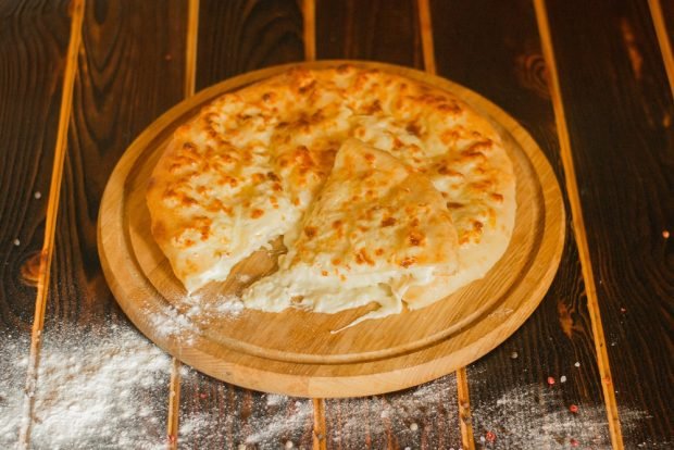 Khachapuri with Adyghe cheese and suluguni 