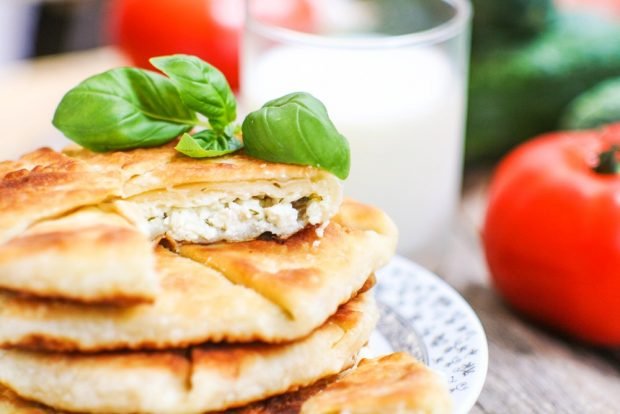 Khachapuri with cheese and herbs 