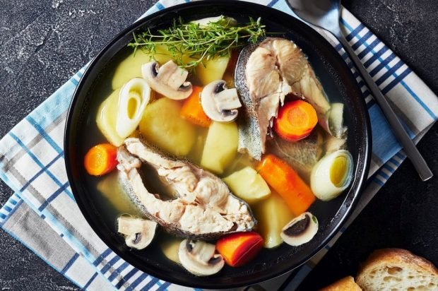 Trout soup with potatoes and champignons