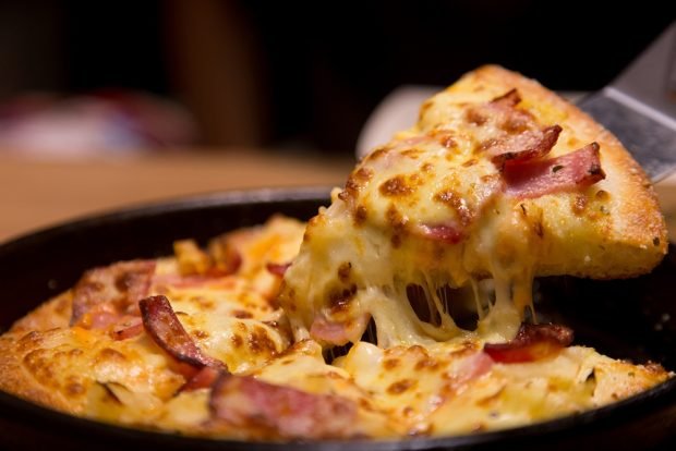 Bacon pizza in a frying pan 