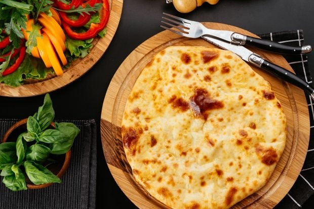 Pita bread khachapuri with meat and vegetables 