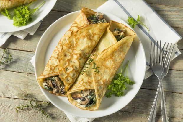 Pancakes with mushrooms and spinach