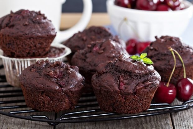 Chocolate muffins with cherries