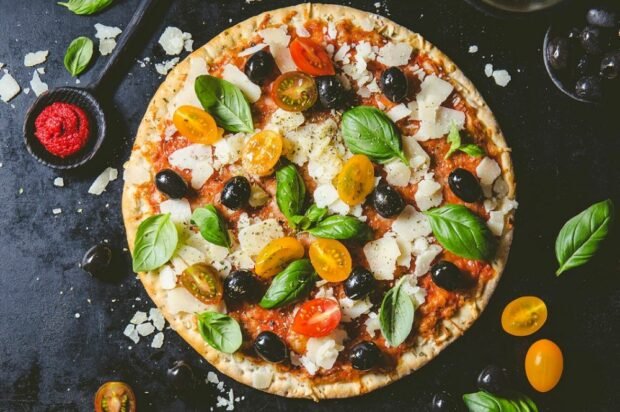 Classic Italian pizza with tomatoes and parmesan 