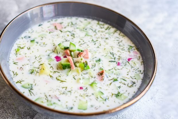 Okroshka with boiled sausage and peas