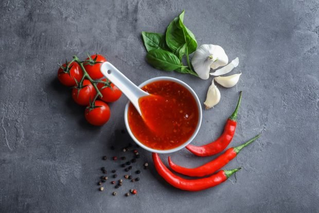 Tomato ketchup with basil for winter 