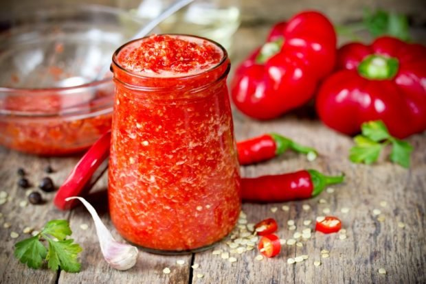 Raw adjika with tomatoes, pepper and garlic for winter