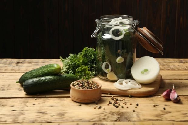 Pickled cucumbers with onions for winter