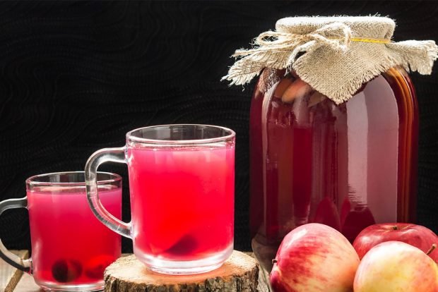 Compote of red cherry with apples for winter 