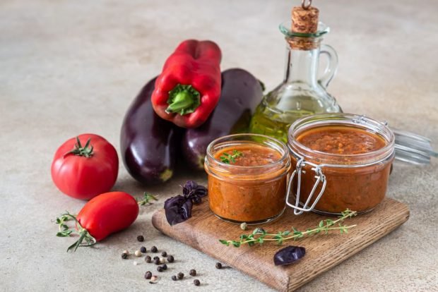 Eggplant caviar with tomatoes and pepper for winter through a meat grinder