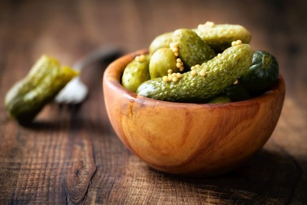 Pickled cucumbers with mustard for the winter in jars