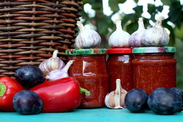 Adjika of plums, tomatoes and peppers for winter