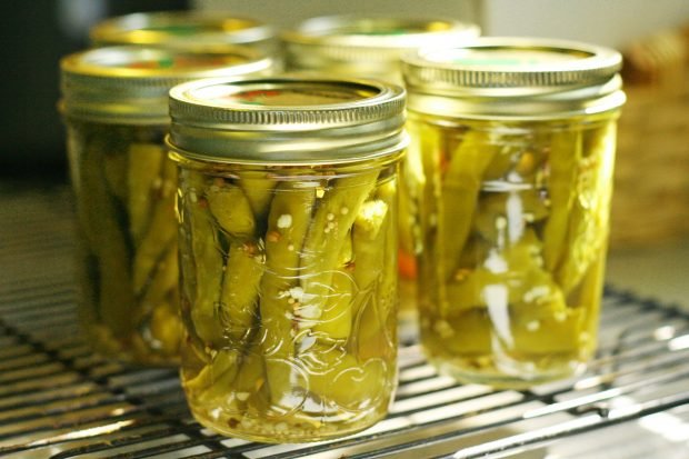 Pickled string beans for winter in cans 