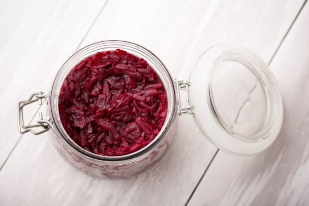 Beetroot and carrot borscht dressing with tomatoes for winter