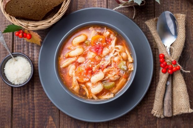 Thick soup of turkey, pasta and beans 