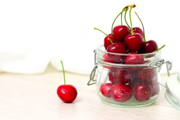 Cherry compote on a leg for winter