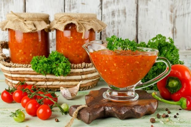 Adjika of zucchini with tomatoes, bell pepper and vinegar