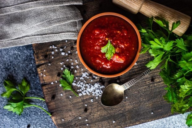 Georgian satsebeli made of tomatoes, pepper and garlic for winter