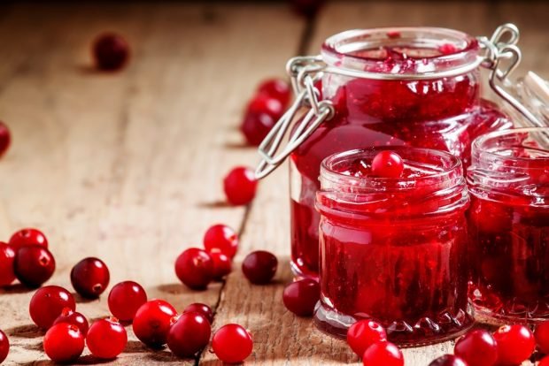 Cranberries with orange and sugar for winter