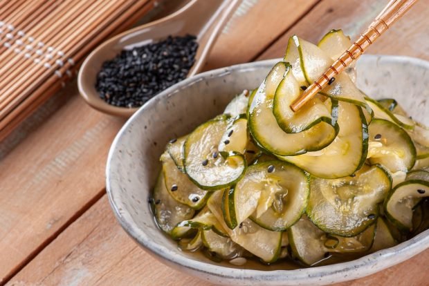 Cucumbers in Korean with onions for winter