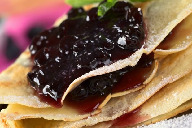 Thick blueberry jam with whole berries 